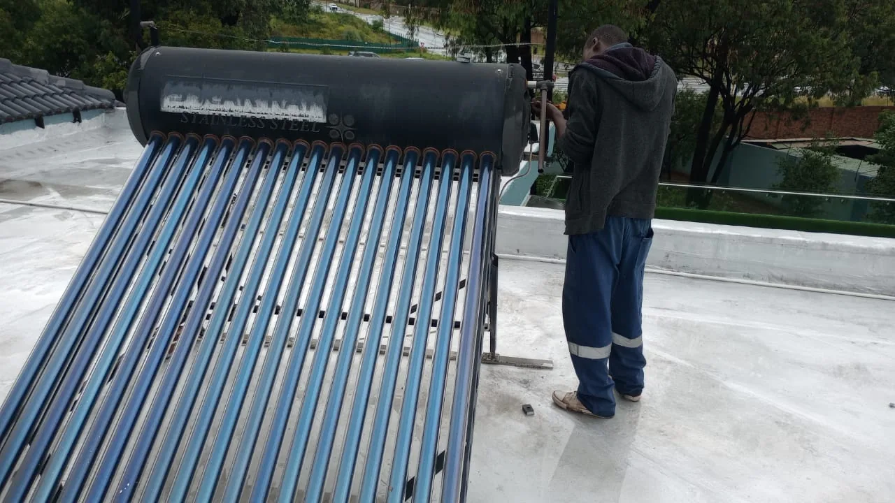 technician completing a professional 200 litre solar geyser installation